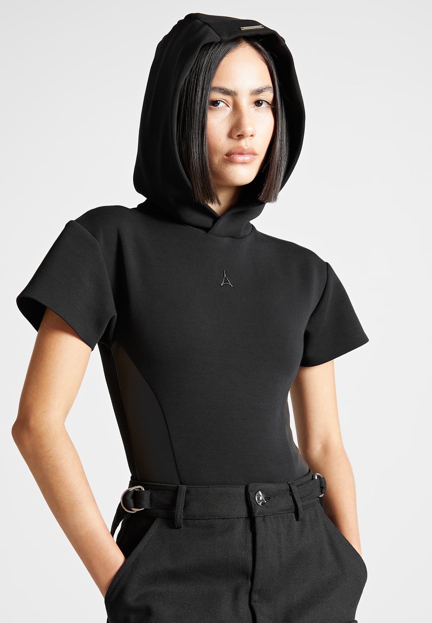 http://www.manieredevoir.com/cdn/shop/files/Short-Sleeve-Bodysuit-with-Hood-Black5.jpg?v=1684944555
