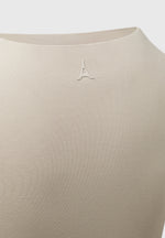 eternelle-high-leg-long-sleeve-bodysuit-beige