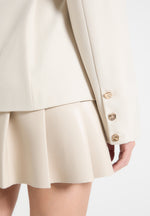 tailored-cinch-blazer-dress-with-pleats-beige