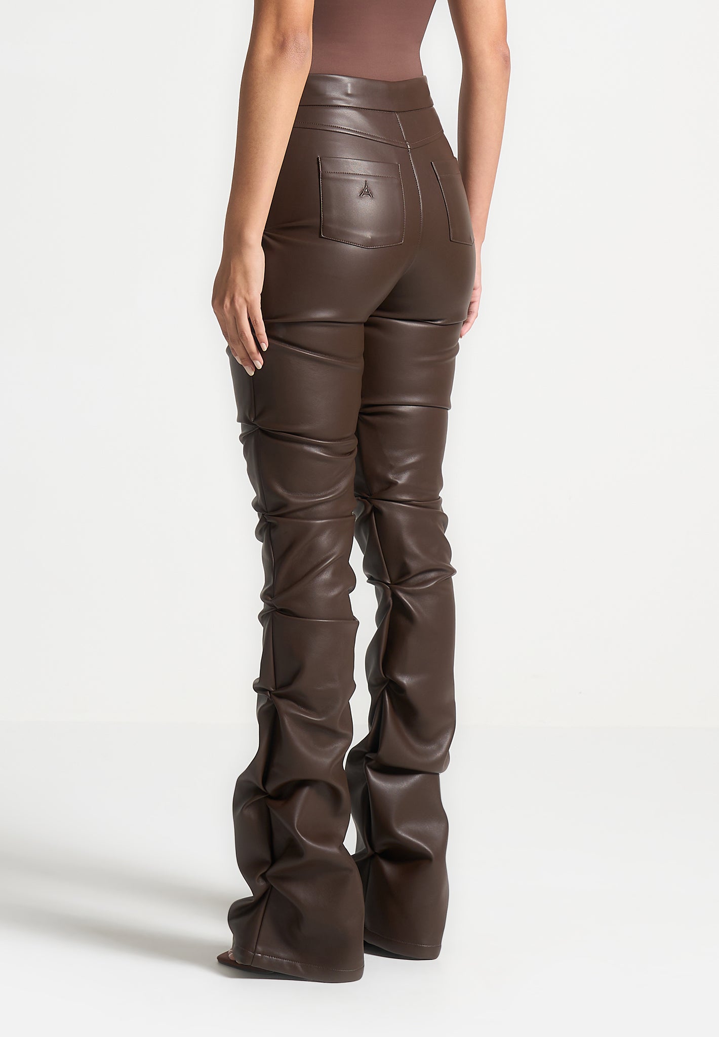 tacked-vegan-leather-flared-trousers-brown